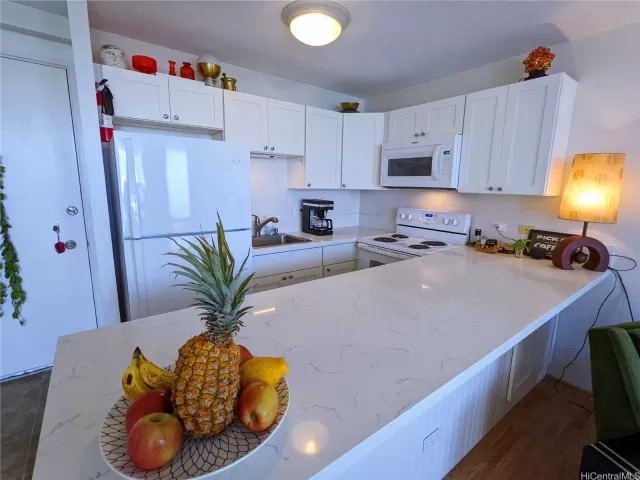 MLS: 202302373 Condo For Sale